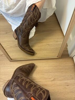 Brown leather cowboy boots